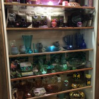 customized shelving, wood trimmed glass