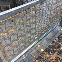 reclaimed cnc scrap incorporated into fencing panel